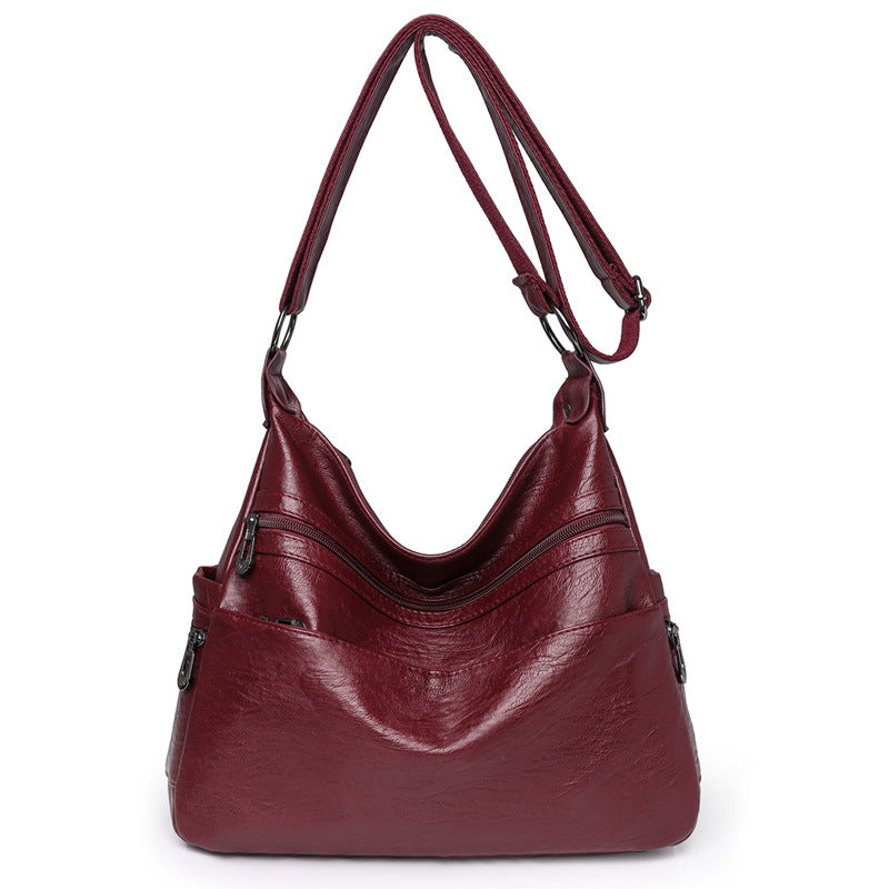 Moderno bolso bandolera de piel suave y gran capacidad