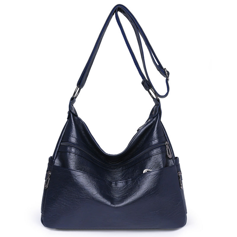 Moderno bolso bandolera de piel suave y gran capacidad