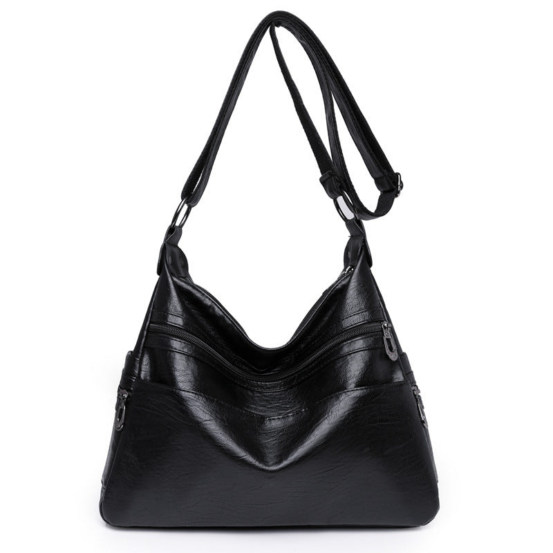 Moderno bolso bandolera de piel suave y gran capacidad