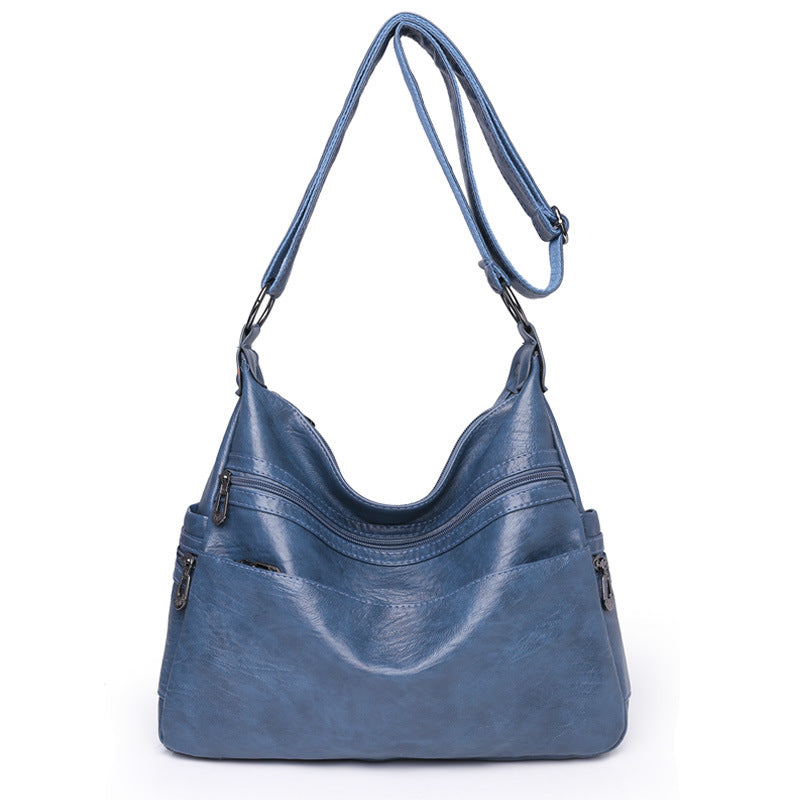 Moderno bolso bandolera de piel suave y gran capacidad