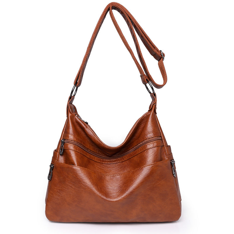 Moderno bolso bandolera de piel suave y gran capacidad